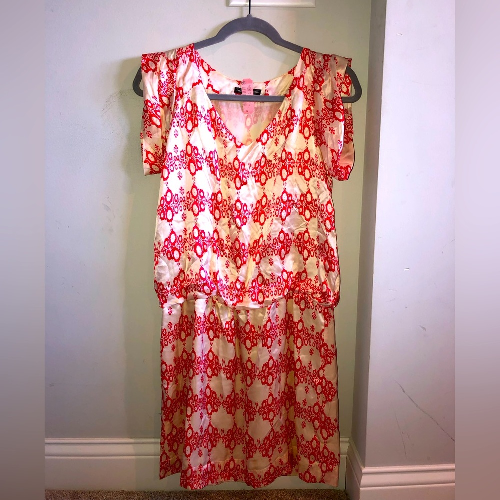 100% Silk dress, Collective Clothing, hits mid thigh and I am 5’11.